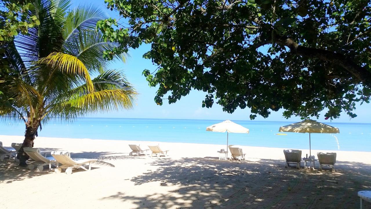 Отель Idle Awhile Beach Негрил Экстерьер фото